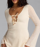 Soak up the season in the Dreamy Boho Bell Sleeve Knit Mini Dress, a ivory sundress styled for easy days, outdoor plans, and everything in between.