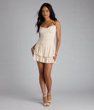 Soak up the season in the Such A Cutie Halter Ruffle Mini Dress, a ivory sundress styled for easy days, outdoor plans, and everything in between.