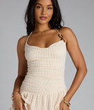 Soak up the season in the Such A Cutie Halter Ruffle Mini Dress, a ivory sundress styled for easy days, outdoor plans, and everything in between.