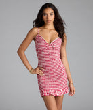 Step into summer looking effortlessly chic in the Girly Gingham Print Ruffled Mini Dress in red, a must-have Windsor dress for your warm-weather wardrobe.