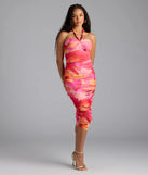 Step into summer looking effortlessly chic in the Captivated In Floral Halter Bodycon Midi Dress in pink, a must-have Windsor dress for your warm-weather wardrobe.