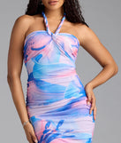 Step into summer looking effortlessly chic in the Captivated In Floral Halter Bodycon Midi Dress in blue, a must-have Windsor dress for your warm-weather wardrobe.