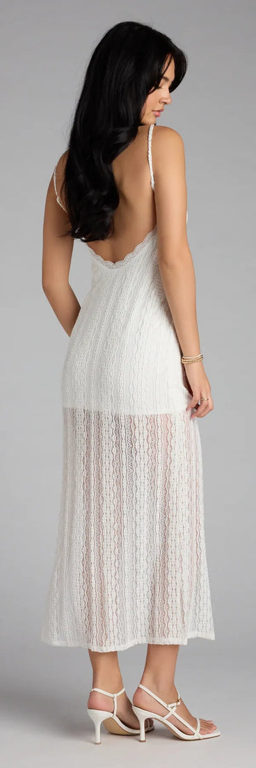 The All Eyes on You Lace Low Back Midi Dress in white features a flattering fit and mid-calf hem, redefining effortless midi dresses for any occasion.
