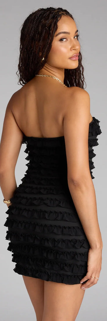 Feel ready for every dance floor moment or feed-worthy reel in the Serving Ruffles Mini Tube Dress, a black homecoming dress designed to own your moment.