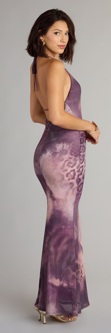 The Untamed Aura Animal Print Halter Maxi Dress is your new go-to Windsor dress—effortless, versatile, and made to update your fall style in seconds.