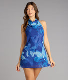 The Ocean Bloom Halter Mini Dress is your new go-to Windsor dress—effortless, versatile, and made to update your fall style in seconds.