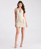 Make a bold statement in the All The Attention Collared Cargo Mini Dress in natural, the perfect spring dress for weddings, cocktail hours, nights out, and/or seasonal celebrations.