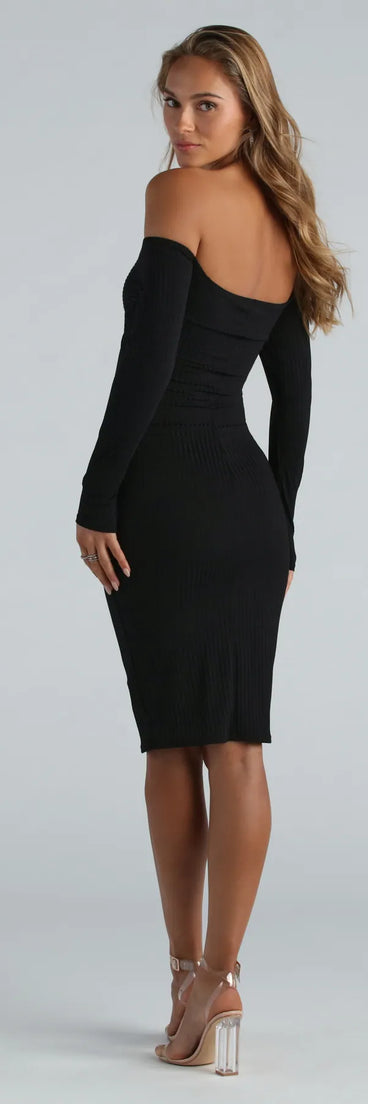 The Off My Mind Cutout Long Sleeve Ribbed Knit Midi Dress is a cozy sweater dress made from soft, stretchy fabric, perfect for layering on chilly winter days or dressing up as a warm holiday dress.