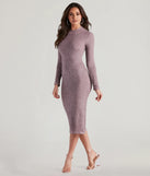 With its mid-calf hem and popular flattering fit, the Cozy Love Mock Neck Midi Dress in taupe nails the balance of trend and ease, redefining go-to midi dresses for any occasion.