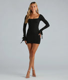 Make a bold statement in the Simply Amazing Long Bell Sleeve Mini Dress in black, the perfect spring dress for weddings, cocktail hours, nights out, and/or seasonal celebrations.
