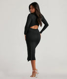 The Standout Staple Crew Neck Cutout Midi Dress in black is a women's workwear piece offering a trendy style and unique accents, perfect for effortlessly creating an outfit-of-the-day look that transitions your office look to going-out ready.