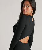 The Standout Staple Crew Neck Cutout Midi Dress in black is a women's workwear piece offering a trendy style and unique accents, perfect for effortlessly creating an outfit-of-the-day look that transitions your office look to going-out ready.