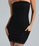 Step into winter chic with the Can't Deny Strapless Cargo Mini Dress, a black mini dress featuring an above-the-knee cut ideal for cocktail parties, festive gatherings, or clubwear.
