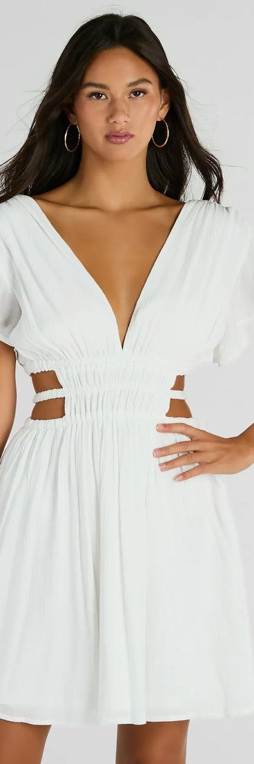 The Spice Things Up V-Neck Cutout Skater Dress is your new go-to white dress—effortless, versatile, and made to update your fall style in seconds.