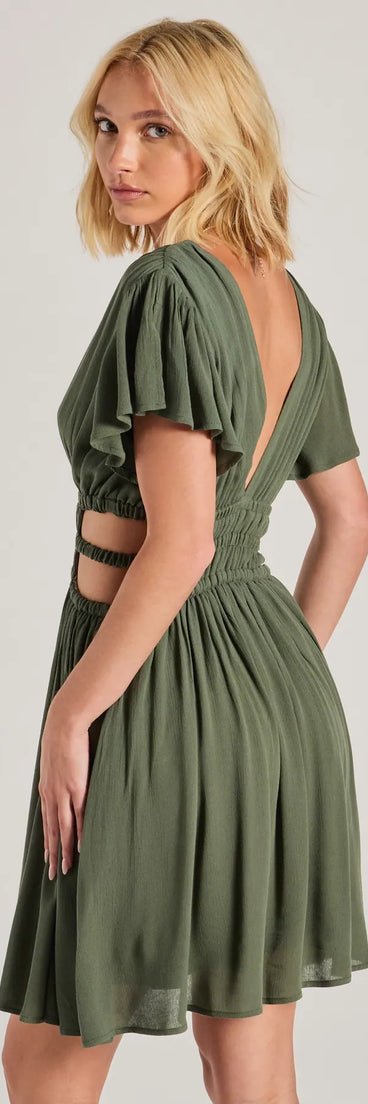 Soak up the season in the Spice Things Up V-Neck Cutout Skater Dress, a olive green sundress styled for easy days, outdoor plans, and everything in between.