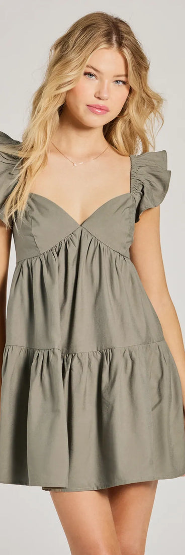 The Beyond Precious V-Neck Ruffle Babydoll Dress is a mini dress that will make a statement with its short hemline and on-trend details to have you ready for any event!
