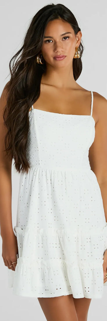 The Feeling Amore Tie-Back A-Line Eyelet Mini Dress is a mini dress that will make a statement with its short hemline and on-trend details to have you ready for any event!