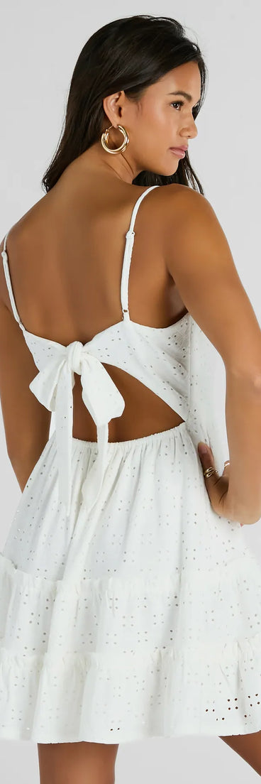 The Feeling Amore Tie-Back A-Line Eyelet Mini Dress is a casual dress for more than special occasions with a fitted or flowy silhouette and accents in the most recent trends!