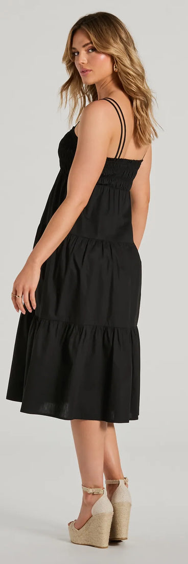 The Darling Appeal Sleeveless Ruffled Midi Dress is a black midi dress, featuring an elevated midi-length silhouette perfect for wedding guest attire, romantic date nights, or effortless everyday styling.