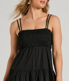 Make a bold statement in the Darling Appeal Sleeveless Ruffled Midi Dress in black, the perfect summer dress for weddings, cocktail hours, nights out, and/or seasonal celebrations.