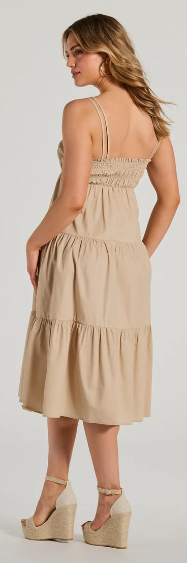 The Darling Appeal Sleeveless Ruffled Midi Dress is a khaki midi dress, featuring an elevated midi-length silhouette perfect for wedding guest attire, romantic date nights, or effortless everyday styling.