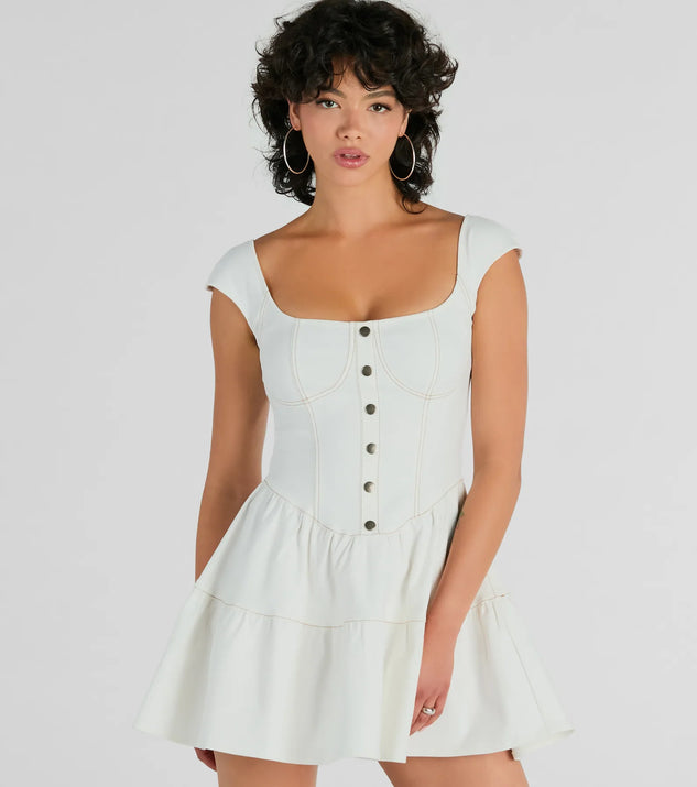 The Trendsetting Effect Ruffled Denim Skater Dress is a white dress, an essential holiday or NYE dress that pairs chic style with versatility making it perfect for cocktail events, New Year's Eve parties, or as a winter wedding guest look.
