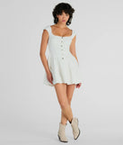 The Trendsetting Effect Ruffled Denim Skater Dress is a white dress, an essential holiday or NYE dress that pairs chic style with versatility making it perfect for cocktail events, New Year's Eve parties, or as a winter wedding guest look.