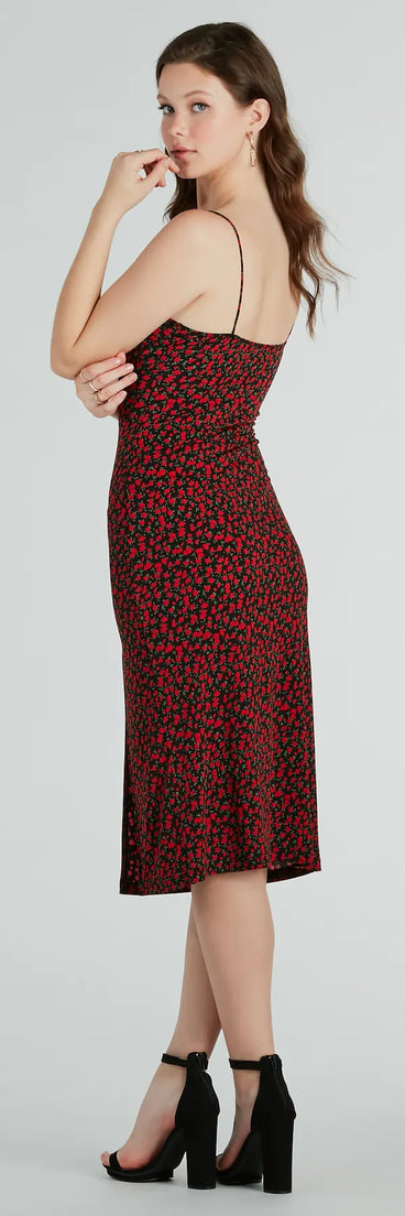 Whether you're headed to brunch or running errands, the Sweet Flair High Slit Ditsy Floral Knit Midi Dress in black delivers effortless style in a breathable, go-to casual dress.