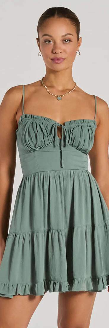 Step into winter chic with the A Sweet Look Sleeveless Ruffled Skater Dress, a sage mini dress featuring an above-the-knee cut ideal for cocktail parties, festive gatherings, or clubwear.