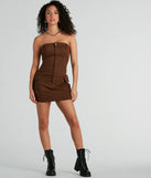Make a bold statement in the Sensational City Girl Strapless Cargo Mini Dress in brown, the perfect spring dress for weddings, cocktail hours, nights out, and/or seasonal celebrations.