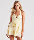 Feel confident and photo-ready in the Sunset Happy Hour Ruffled Skater Dress, a yellow graduation dress perfect for 2025 ceremonies and parties.