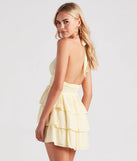 The Sunset Happy Hour Ruffled Skater Dress in yellow brings sleek style to any graduation outfit, from cap and gown to after-party.