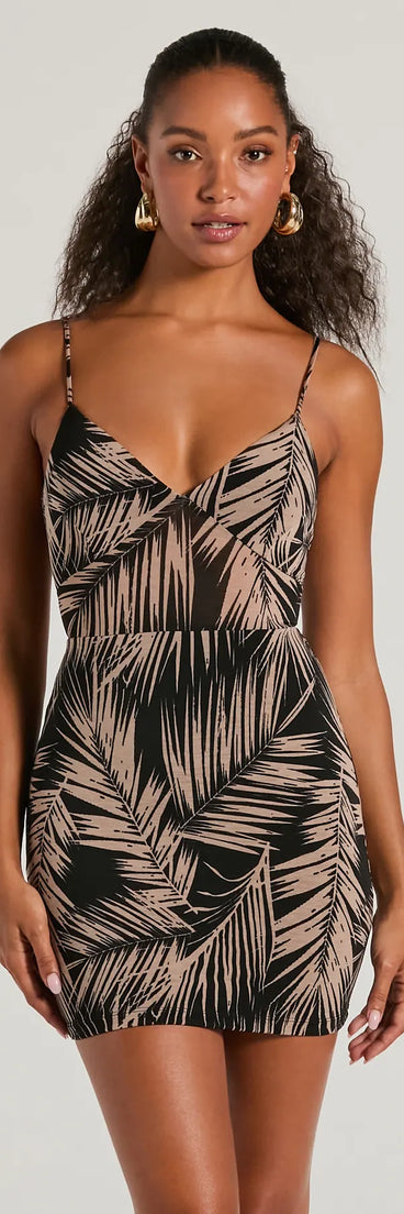 The Crusin' The Tropics Lace-Up Tropical Mini Dress is a mini dress that will make a statement with its short hemline and on-trend details to have you ready for any event!