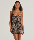 The Crusin' The Tropics Lace-Up Tropical Mini Dress is a mini dress that will make a statement with its short hemline and on-trend details to have you ready for any event!