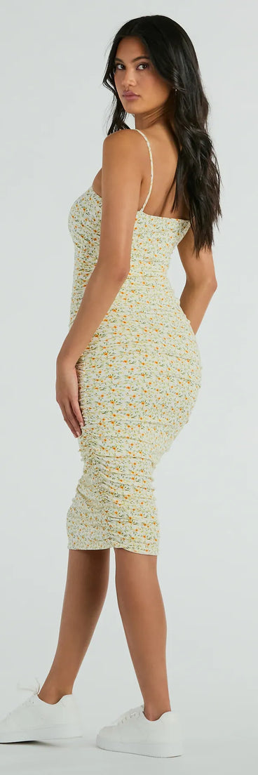The Smell The Garden Square Neck Floral Midi Dress is a yellow midi dress, featuring an elevated midi-length silhouette perfect for wedding guest attire, romantic date nights, or effortless everyday styling.