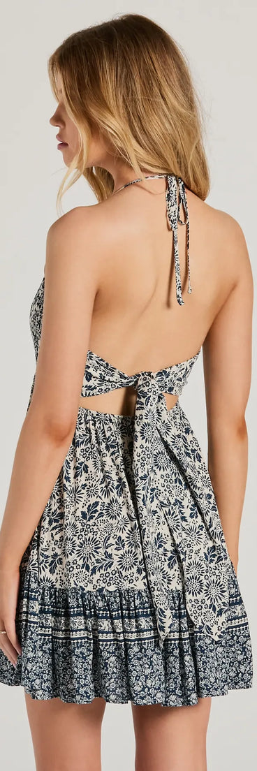 Whether you're headed to brunch or running errands, the Sway With Me Halter V-Neck Paisley Skater Dress in navy blue delivers effortless style in a breathable, go-to casual dress.