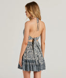 Whether you're headed to brunch or running errands, the Sway With Me Halter V-Neck Paisley Skater Dress in navy blue delivers effortless style in a breathable, go-to casual dress.