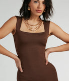 Stay stylish and warm in the Smooth Silhouette Square Neck Tank Midi Dress, a textured knit sweater dress that's ideal for a winter date-night outfit or a chic brunch look.