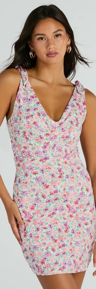 The Darling Flirtation Tie Strap V-Neck Floral Mini Dress is a mini dress that will make a statement with its short hemline and on-trend details to have you ready for any event!