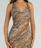The midi dress length on the Natural Sweetheart Halter Marble Print Midi Dress provides an elevated silhouette perfect for any party, occasion, or everyday styling.