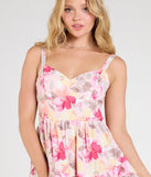 The Charmed Sweetness Lace-Up Floral Skater Dress in pink brings sleek style to any graduation outfit, from cap and gown to after-party.