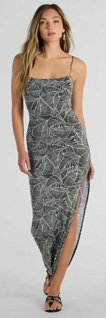 The Miami Nights Sleeveless Tropical Slit Maxi Dress is a casual dress for more than special occasions with a fitted or flowy silhouette and accents in the most recent trends!