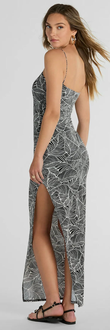 The Miami Nights Sleeveless Tropical Slit Maxi Dress is a casual dress for more than special occasions with a fitted or flowy silhouette and accents in the most recent trends!