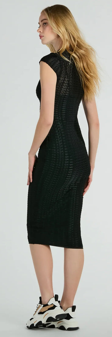 The Casually Flawless Crew Neck Textured Midi Dress is a black midi dress, featuring an elevated midi-length silhouette perfect for wedding guest attire, romantic date nights, or effortless everyday styling.