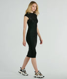 Revamp your 2025 wardrobe with this chic addition, the Casually Flawless Crew Neck Textured Midi Dress in black, perfect for elevating your style in the new year.