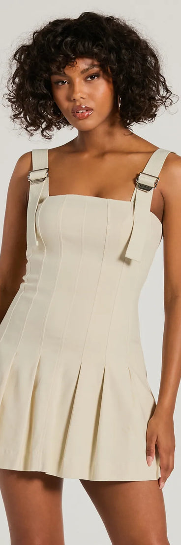 Step into winter chic with the Babe With Taste Buckle Strap Pleated Mini Dress, a taupe mini dress featuring an above-the-knee cut ideal for cocktail parties, festive gatherings, or clubwear.