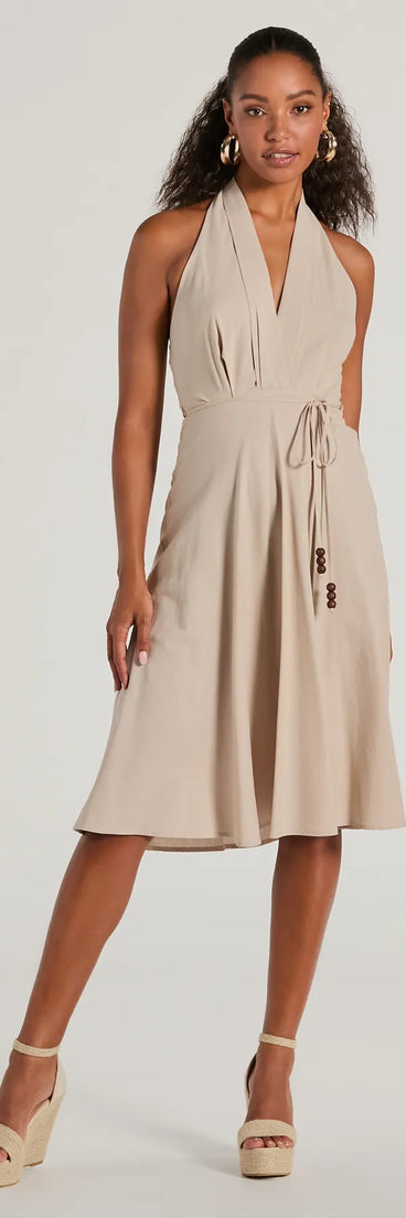 The Delightful Charm Halter A-Line Midi Dress is your new go-to natural dress—effortless, versatile, and made to update your fall style in seconds.