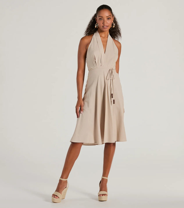 The midi dress length on the Delightful Charm Halter A-Line Midi Dress provides an elevated silhouette perfect for any party, occasion, or everyday styling.