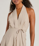 Make a bold statement in the Delightful Charm Halter A-Line Midi Dress in natural, the perfect spring dress for weddings, cocktail hours, nights out, and/or seasonal celebrations.