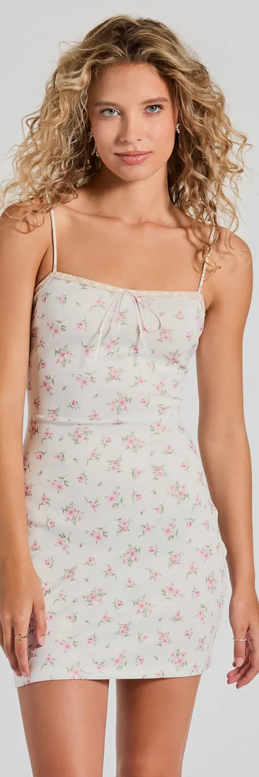 The Effortless Cutie Bow Lace-Up Floral Mini Dress is a mini dress that will make a statement with its short hemline and on-trend details to have you ready for any event!